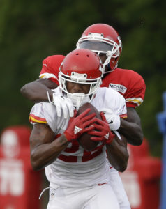 Aug. 17, 2015; St. Joseph, MO; Chiefs rookie cornerback Marcus Peters (22) intercepts a pass intended for wide receiver Jeremy Maclin (19) during training camp. (AP Photo/Orlin Wagner)