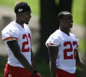 Aug. 1, 2015; St. Joseph, MO; Chiefs cornerbacks Sean Smith (21) and rookie Marcus Peters (22) talk while walking to a training camp practice. (AP Photo/Orlin Wagner)