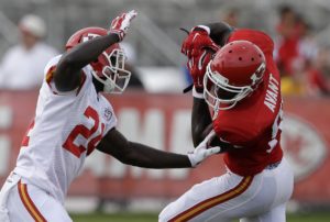 Aug. 9, 2015; St. Joseph, MO; Chiefs wide receiver Jason Avant (81) makes a catch as safety Kelcie McCray (24) covers during a training camp practice. (AP Photo/Orlin Wagner)
