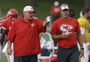 Aug. 17, 2015; St. Joseph, MO; Chiefs head coach Andy Reid (left) and offensive coordinator Doug Pederson (right) talk during training camp. (AP Photo/Orlin Wagner)