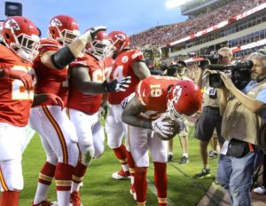 Aug. 21, 2015; Kansas City, MO; Chiefs wide receiver Jeremy Maclin (19) gets congratulated by his teammates after scoring the first touchdown against Seattle during the first half of Friday night's preseason game at Arrowhead Stadium. (Chris Neal/The Topeka Capital-Journal)