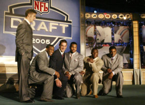 Alex Smith, left, with cornerback Antrel Rolle, quarterback Aaron Rodgers, wide receiver Braylon Edwards, running back Ronnie Brown and running back Cedric Benson at the 2005 NFL Draft in New York. (AP Photo/Gregory Bull)