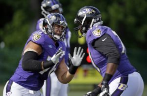 Aug. 8, 2015; Owings Mills, MD; Offensive lineman Jah Reid, left, runs a drill with De'Ondre Wesley during training camp with the Baltimore Ravens. (AP Photo/Patrick Semansky)