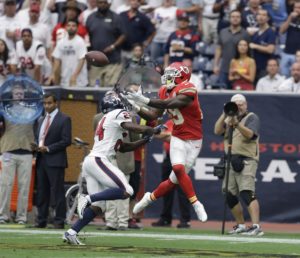 Sept. 13, 2015; Houston; Chiefs wide receiver Jeremy Maclin (19) reaches for a pass over Houston Texans defender Johnathan Joseph (24) during the second half at NRG Stadium. The officials ruled the pass incomplete after determining Maclin didn't maintain possession when sliding out of bounds. (AP Photo/Patric Schneider)