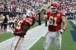 Sept. 13, 2015; Houston; Chiefs rookie center Mitch Morse (61) celebrates with running back Jamaal Charles (25) after a touchdown against the Texans at NRG Stadium. (AP Photo/David J. Phillip)