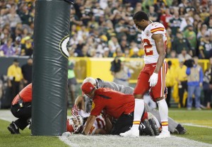 Sept. 28, 2015; Green Bay, WI; Chiefs medical personnel tend to cornerback Phillip Gaines in the first half against the Packers at Lambeau Field. (AP Photo/Matt Ludtke)