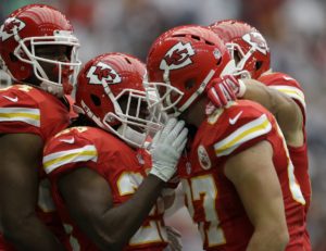 Sept. 13, 2015; Houston; Chiefs tight end Travis Kelce (87) celebrates with teammates after first-half play against the Houston Texans at NRG Stadium. (AP Photo/Patric Schneider)