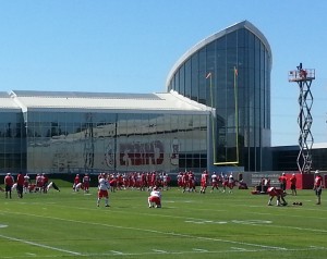 Sept. 30, 2015; Kansas City, MO: General view of Chiefs players warming up before practice at the team's training facility. (Credit: Teope)