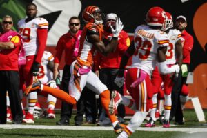 Oct. 4, 2015; Cincinnati; Bengals wide receiver A.J. Green (18) makes a catch as Chiefs safety Husain Adbullah (39) pursues in the first half at Paul Brown Stadium. (AP Photo/Frank Victores)