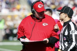 Oct. 18, 2015; Minneapolis; Chiefs head coach Andy Reid talks with side judge Walt Coleman IV during the first half against the Vikings at TCF Bank Stadium. (AP Photo/Jim Mone)