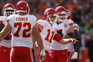 Oct. 4, 2015; Cincinnati; Chiefs quarterback Alex Smith (11) surrounded by his offensive lineman against the Bengals at Paul Brown Stadium. (AP Photo/Gary Landers)