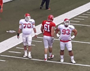 Nov. 11, 2015; Kansas City, MO; Chiefs defensive end Mike DeVito (70) during warmups alongside center Mitch Morse (61) and defensive tackle Hebron Fangupo (93) at the team's indoor training facility. 