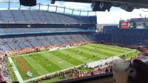 Nov. 15, 2015; Denver; General view from the press box of players warming on the field before the Broncos host the Kansas City Chiefs at Sports Authority Field at Mile High. (Credit: Teope)