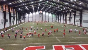Nov. 26, 2015; Kansas City, MO: General view of players warming up during portion of practice open to media at the Chiefs indoor training facility. (Credit: Teope)