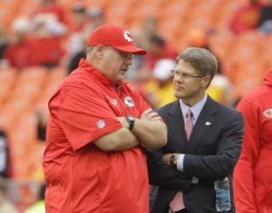 Dec. 14, 2015; Kansas City, MO; Chiefs chairman and CEO Clark Hunt (right) visits with coach Andy Reid before a game at Arrowhead Stadium. (AP Photo/Charlie Riedel)