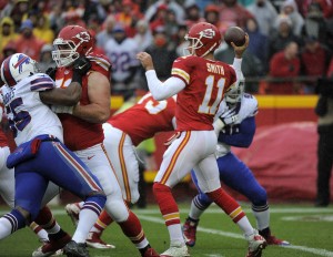 Nov. 29, 2015; Kansas City, MO; Chiefs quarterback Alex Smith (11) throws out of the pocket against the Buffalo Bills at Arrowhead Stadium. (AP Photo/Ed Zurga)