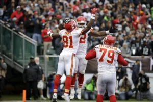 Dec. 6, 2015; Oakland; Chiefs running back Spencer Ware (32) celebrates with wide receiver Jason Avant (81) and tackle Donald Stephenson (79) after scoring on a touchdown against the Oakland Raiders at O.co Coliseum. (AP Photo/Marcio Jose Sanchez)