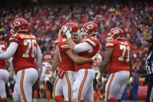 Dec. 27, 2015; Kansas City, MO; Chiefs tight end Travis Kelce (87) and center Mitch Morse (61) celebrate a touchdown by Kelce during the first half against the Cleveland Browns at Arrowhead Stadium. (AP Photo/Ed Zurga)