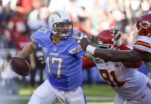 Nov. 22, 2015; San Diego; Chargers quarterback Philip Rivers (17) attempts to escape pressure from Chiefs outside linebacker Tamba Hali (91) at Qualcomm Stadium. (AP Photo/Denis Poroy)