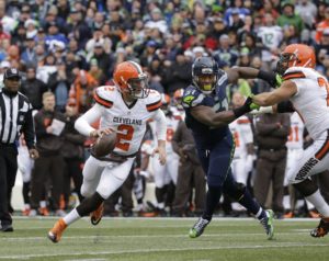 Dec. 20, 2015; Seattle; Cleveland Browns quarterback Johnny Manziel (2) scrambles out of the pocket in the first half as Seahawks outside linebacker Bruce Irvin (51) pursues at CenturyLink Field. (AP Photo/Ted S. Warren)