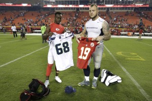 Aug. 21, 2015; Kansas City, MO; Former Missouri Tigers, Chiefs wide receiver Jeremy Maclin (left) and Seattle Seahawks tackle Justin Britt (right), exchange jerseys after a preseason game at Arrowhead Stadium. (AP Photo/Charlie Riedel)