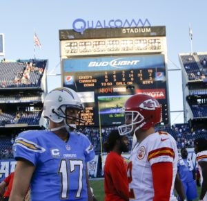 Nov. 22, 2015; San Diego; Chargers quarterback Philip Rivers (17) and Kansas City Chiefs punter Dustin Colquitt (2) talk after the game at Qualcomm Stadium. (AP Photo/Lenny Ignelzi)