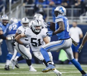 Nov. 22, 2015; Detroit; Oakland Raiders linebacker Ben Heeney (51) closes in on Lions wide receiver Calvin Johnson (81) during the first half at Ford Field. (AP Photo/Rick Osentoski)