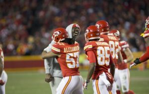 Jan. 3, 2016; Kansas City, MO; Chiefs outside linebacker Justin Houston (in sweatshirt) greets teammates as they come to the sideline against the Oakland Raiders at Arrowhead Stadium. (Emily DeShazer/The Topeka Capital-Journal)