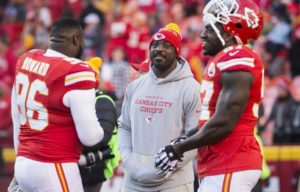 Jan. 3, 2016; Kansas City, MO; Chiefs outside linebacker Justin Houston (center) interacts with defensive linemen Jaye Howard (96) and Allen Bailey (97) on the sidelines at Arrowhead Stadium. (Emily DeShazer/The Topeka Capital-Journal) 