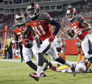 Aug. 28, 2014; Tampa; Buccaneers defensive back Keith Lewis (41) celebrates after intercepting a pass in a preseason game against Washington at Raymond James Stadium. (AP Photo/Brian Blanco)