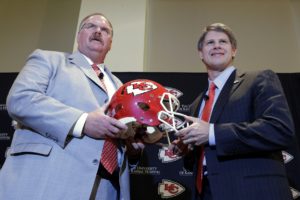 Jan. 7, 2013; Kansas City, MO; Andy Reid (left) and Chiefs chairman and CEO Clark Hunt (right) pose for photographers during Reid's introductory news conference at Arrowhead Stadium. (AP Photo/Charlie Riedel)