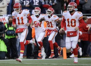 Jan. 16, 2016; Foxborough, MA; Kansas City Chiefs quarterback Alex Smith (11) leads the team onto the field against the New England Patriots at Gillette Stadium. (AP Photo/Steven Senne)
