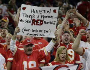 Jan. 9, 2016; Houston; Kansas City Chiefs fans celebrate during the second half against the Texans at NRG Stadium. (AP Photo/Tony Gutierrez)