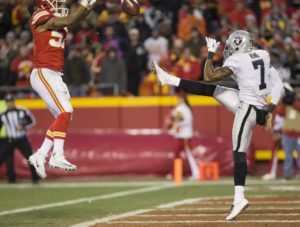 Jan. 3, 2016; Kansas City, MO; Chiefs rookie linebacker D.J. Alexander (57) blocks a punt by Oakland Raiders punter Marquette King (7) at Arrowhead Stadium. (Emily DeShazer/The Topeka Capital-Journal)