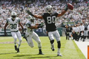 Sept. 7, 2014; East Rutherford, NJ; Then-Oakland Raiders wide receiver Rod Streater (80) scores a touchdown against the New York Jets at MetLife Stadium. (AP Photo/Seth Wenig)