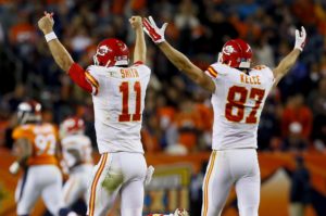 Nov. 15, 2015; Denver; Kansas City Chiefs quarterback Alex Smith (11) and tight end Travis Kelce (87) celebrate a touchdown against the Broncos at Sports Authority Field at Mile High. (AP Photo/Joe Mahoney)