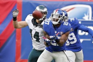 Dec. 28, 2014; East Rutherford, NJ; Then-New York Giants safety Stevie Brown (27) intercepts a pass against the Philadelphia Eagles at MetLife Stadium. (AP Photo/Julio Cortez)