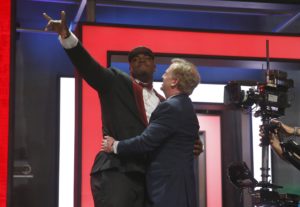 April 29, 2016; Chicago; Mississippi State defensive lineman Chris Jones (left) celebrates with NFL Commissioner Roger Goodell after being selected by the Kansas City Chiefs as the 37th overall pick of the 2016 NFL Draft. (AP Photo/Charles Rex Arbogast)