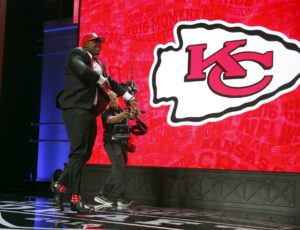 April 29, 2016; Chicago; Mississippi State defensive lineman Chris Jones celebrates after being selected by the Kansas City Chiefs in the second round (37th overall) of the 2016 NFL Draft. (AP Photo/Charles Rex Arbogast)