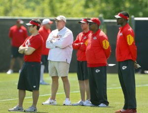 May 7, 2016; Kansas City, MO; Chiefs general manager John Dorsey (gray sweatshirt) observes a rookie minicamp practice at the team's training facility. (Chris Neal/The Topeka Capital-Journal)