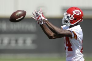 June 10, 2016; Kansas City, MO; Chiefs rookie cornerback D.J. White (24) catches a pass during organized team activities at the team's training facility. (AP Photo/Charlie Riedel)