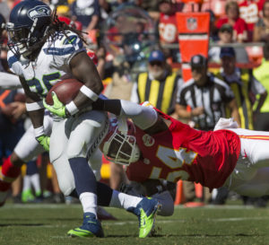 Chiefs linebacker Dezman Moses went horizontal in pursuit of Seattle running back Alex Collins during a preseason game on Saturday, Aug. 13 in Kansas City, Mo. (Emily DeShazer/The Topeka Capital-Journal)