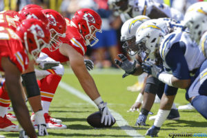 The Kansas City Chiefs offensive line prepares to take a snap during Sunday afternoon's overtime win over the Chargers, 33-27, at Arrowhead Stadium. (Chris Neal/The Topeka Capital-Journal)
