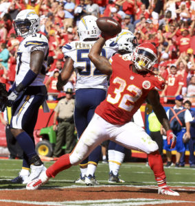 Kansas City's Spencer Ware spikes the ball after scoring a touchdown during the second half of Sunday afternoon's overtime win over the Chargers, 33-27, at Arrowhead Stadium. (Chris Neal/The Topeka Capital-Journal)