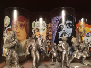 Selected pieces of Matt Derrick's collection of Burger King "Star Wars" glasses and pewter figures.