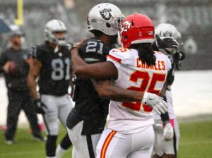Kansas City Chiefs running back Jamaal Charles catches up with former teammate Sean Smith, now a cornerback for the Oakland Raiders, before the teams meet in Oakland on Oct. 16, 2016. (Photo courtesy Chiefs PR, Chiefs.com)