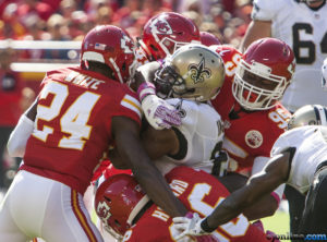 Kansas City Chiefs cornerback D.J. White (24) helps linebacker Dee Ford (55) and defensive lineman Jaye Howard (96) bring a ballcarrier to the ground during the team's 27-21 win over the New Orleans Saints, Oct. 23, 2016. (Nick Tre. Smith/Special to The Topeka Capital-Journal)