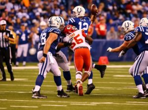 Kansas City Chiefs linebacker Dee Ford hits Indianapolis Colts quarterback Andrew Luck during the Chiefs' 30-14 win at Lucas Oil Stadium on Oct. 30, 2016. (Photo courtesy Chiefs PR, Chiefs.com)