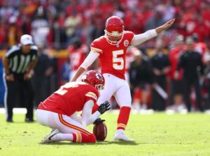 Kansas City Chiefs kicker Cairo Santos (5) boots a kick from the hold of punter Dustin Colquitt (2) during the team's 19-14 win over the Jacksonville Jaguars on Nov. 6, 2016 at Arrowhead Stadium. (Photo courtesy Chiefs PR, Chiefs.com)