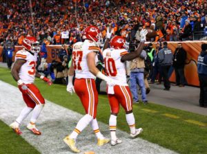 Kansas City Chiefs rookie Tyreek Hill (10) celebrates a touchdown with teammates Travis Kelce (87) and Spencer (32) during the team's 30-27 win over the Denver Broncos at Sports Authority Field at Mile High on Nov. 27, 2016. (Photo courtesy Chiefs PR, Chiefs.com)